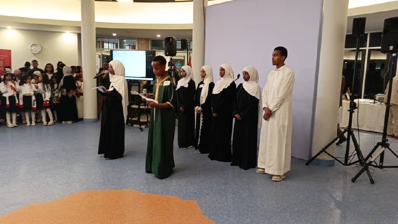 Students in traditional attire present at the International Arabic Language Day celebration at UNECA.
