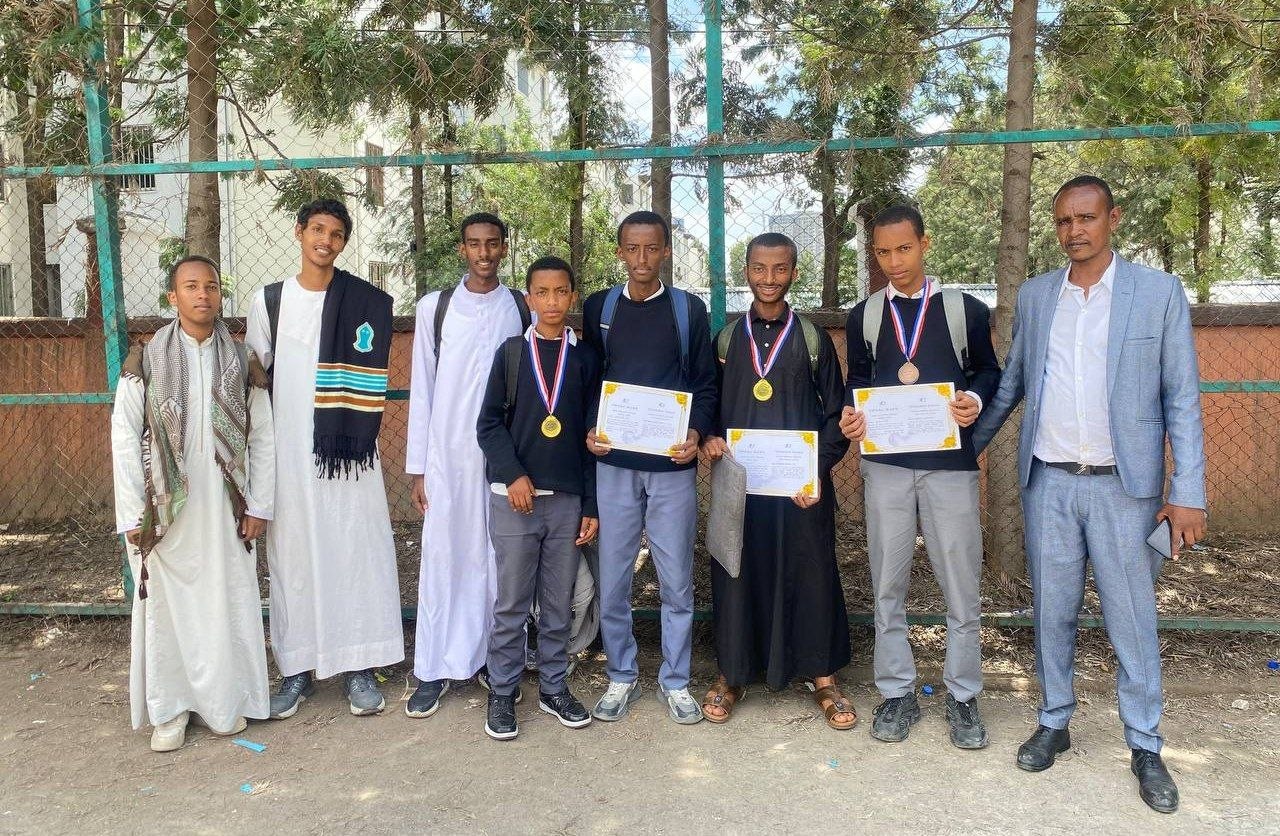 Mekanisa Abadir School students and staff celebrate winning four medals at the Science and Innovation Competition.